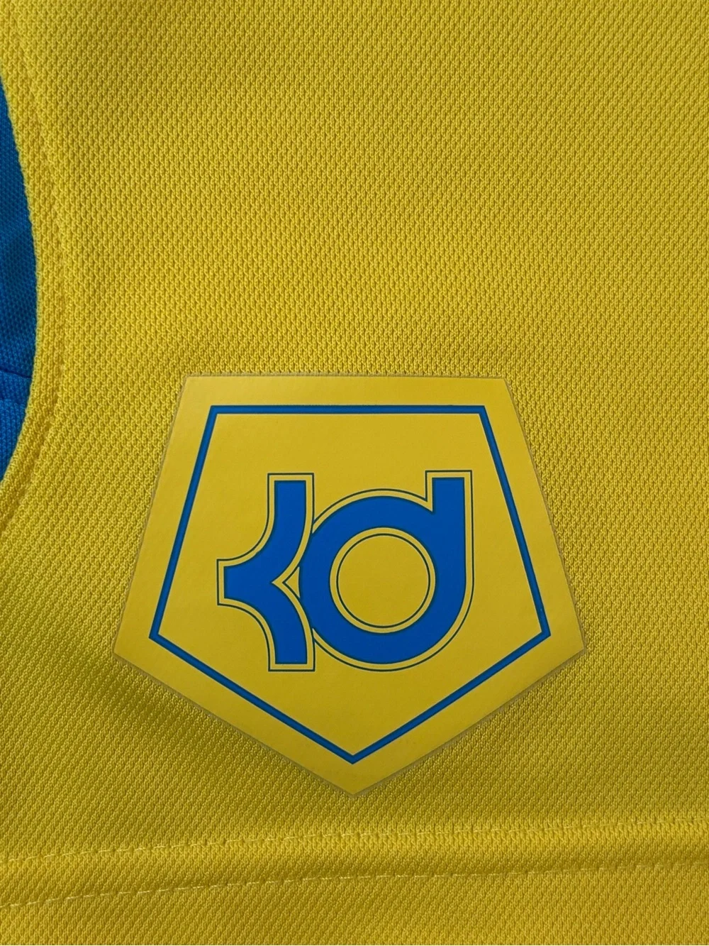 Nike Men’s KD Yellow Athletic Shorts with Blue Accents